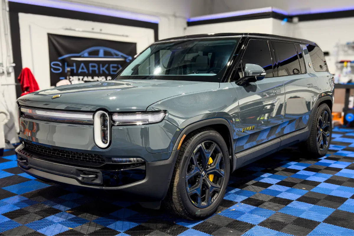 SUV inside professional window tinting shop